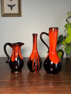 Set of 3 MCM EVANGELINE pottery flame drip vases and pitcher.